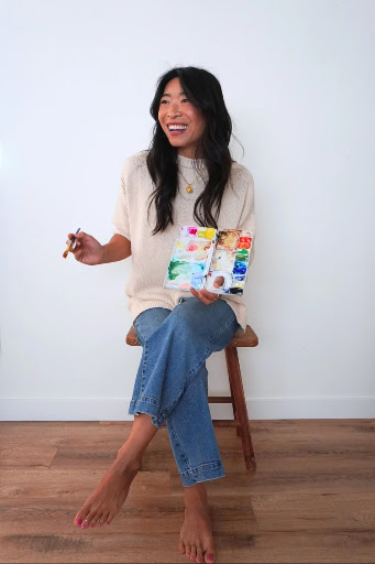 Tiff Chou holding a watercolor palette